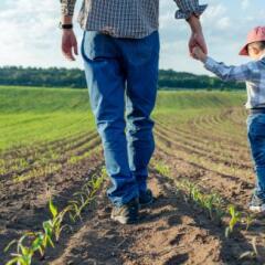 Father showing his son the family business
