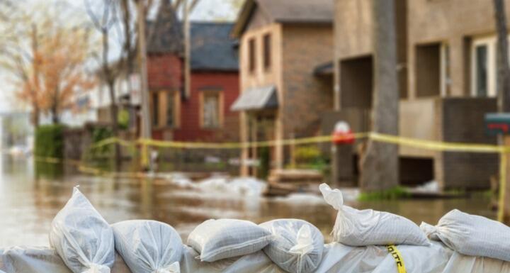 Flooded neighborhood with sandbags