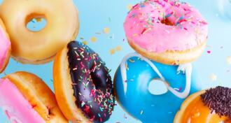 Assorted donuts flying around