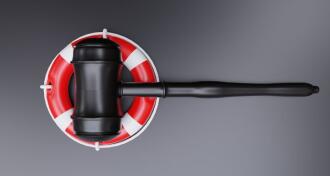 Gavel on lifebuoy