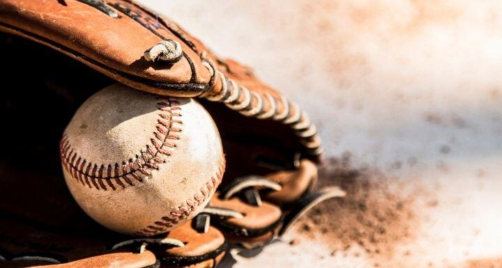 Glove and ball on home plate