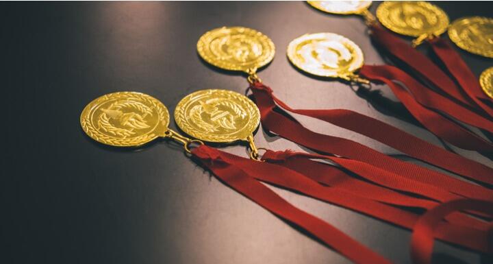 Gold medals with red ribbons