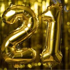 Golden number 21 twenty one made from an inflatable balloon