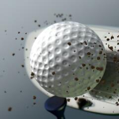 Golf ball being hit by driver