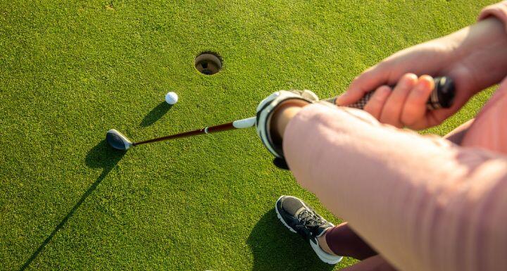 golfer hitting a ball