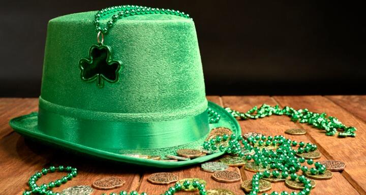 Green hat, necklaces and lucky coins