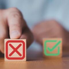 Hand push red Red Cross mark to choose cancellation item 