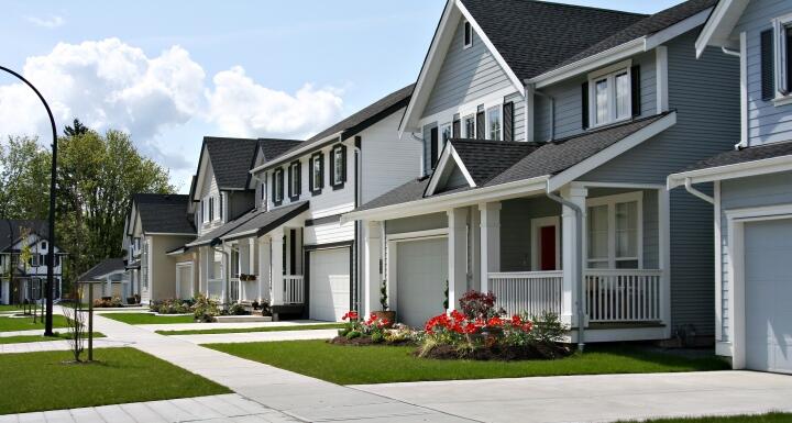 Row of gray houses in a neighborhood