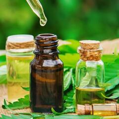 CDB oil containers with hemp leaves