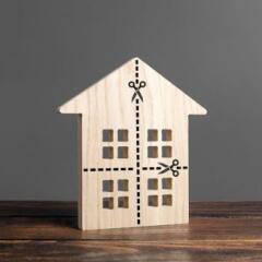 House with marked lines for cutting into four equal parts