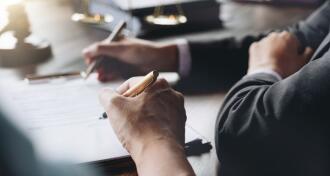 Judge gavel with Justice lawyers having team