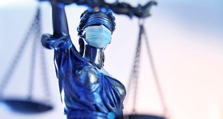 Lady Justice Wearing A Protective Face Mask 