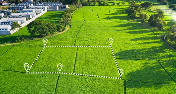 Land plot in aerial view for development