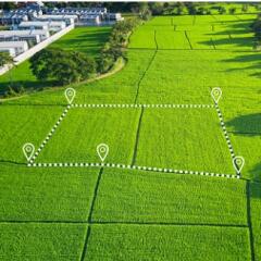 Land plot in aerial view for development