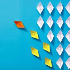 Leadership Concept with Paper Ship