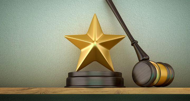 Legal Gavel with Golden Star on Shelf