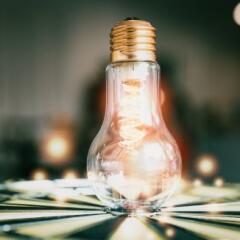 light bulb on dart board