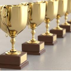 Linary array of gold trophies