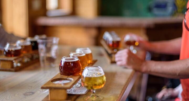 Man sampling beer at local microbrewery