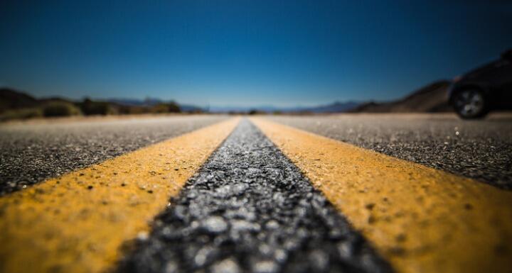 Middle of the Road with Car in background