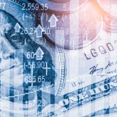 Money with down arrows superimposed over it