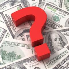 Random layer of 100 bills with a red question mark laying on top