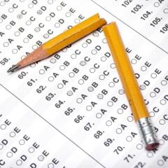 A bubble answer sheet and a broken pencil