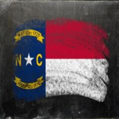 North Carolina flag drawn in chalk on chalkboard