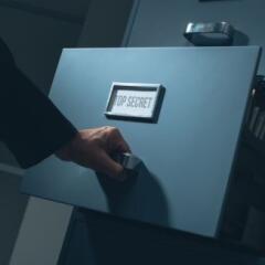 Office worker searching confidential information