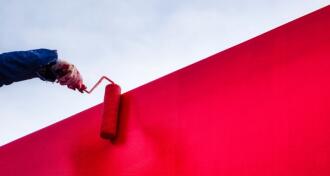 Red latex paint stucco wall