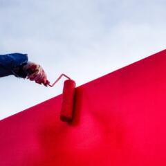 Red latex paint stucco wall