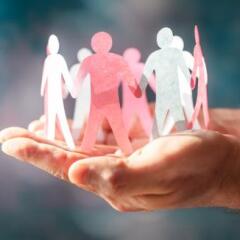 Paper chain friends, teamwork, diversity, family or community, hand holding and protecting 