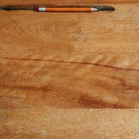 Pencil on wooden desk