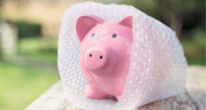 Piggy bank wrapped in bubble wrap