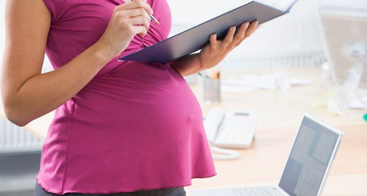 Pregnant Woman with Binder