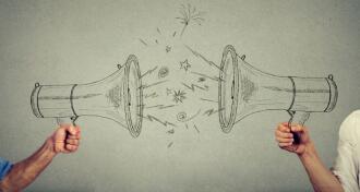 Quarrel between two men screaming at each other in megaphone