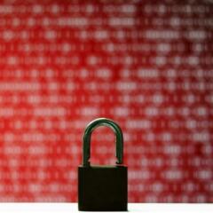 Red binary computer code ransom screen background and lock