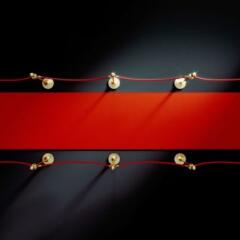 Red carpet over black background. 