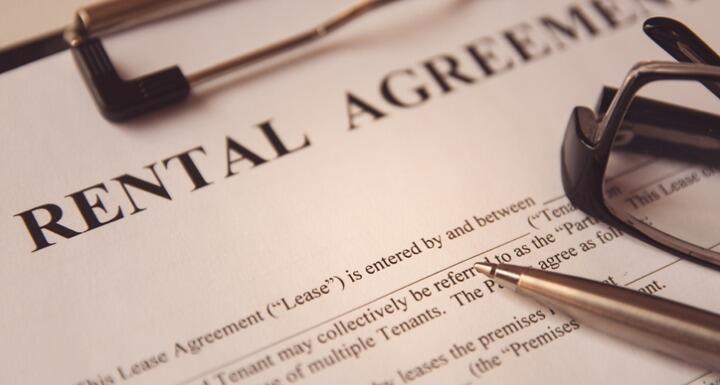 Printed Rental Agreement on a Clipboard