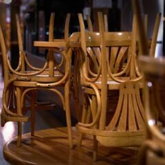 Restaurant closed with chairs on table