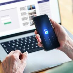 Senior and phone with lock password to protect data in online bank website