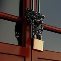 Business building door with a chain and lock