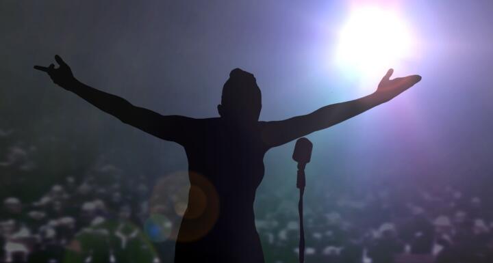 Silhouette of singer on stage