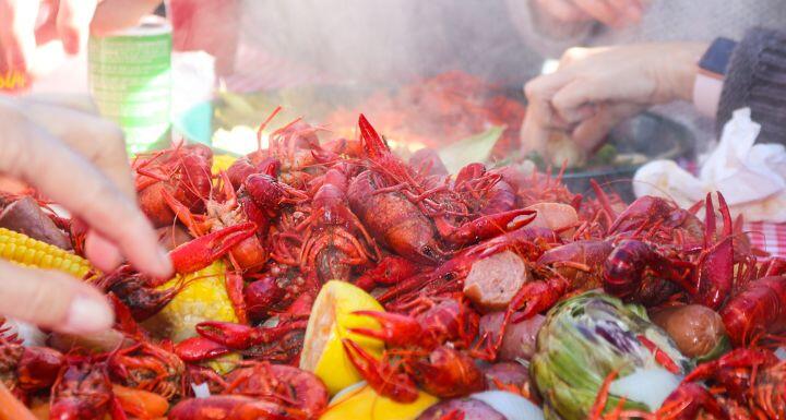 Steaming crayfish and lemons and sausages