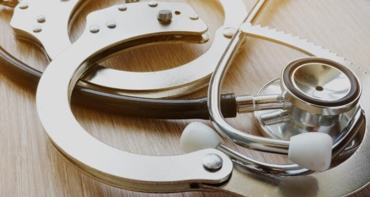 stethoscope and handcuffs