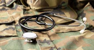 Stethoscope lies over the uniform of a US military officer medical doctor