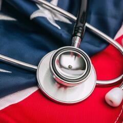 Stethoscope lying on top of American flag