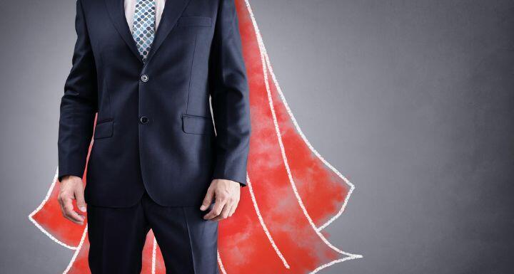 Superhero businessman with red cape 