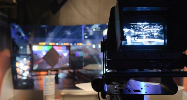 View of television studio through camera lens