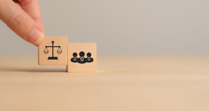 Two blocks with a gavel and group icons